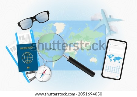 Conceptual illustration of a trip to Cuba with travel gear. World map with compass, passport, tickets, cell phone, plane and glass.