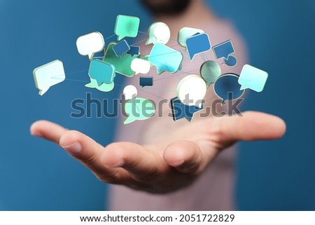 A 3D rendering of speech bubbles floating on hand- online communication concept