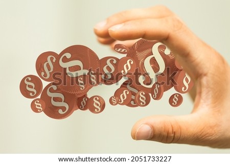 A businessman hand presenting 3D rendered paragraph signs