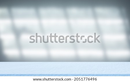 Empty floor blue cement studio with blur light from window Room background. Table Shelf interiors display backdrop. blank room studio construction concrete material rough dark indoor. free space.