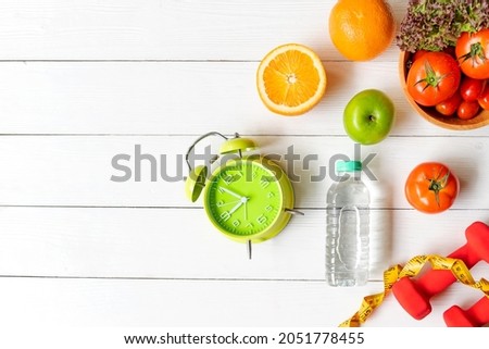 Diet Health eat and food for lifestyle health concept. Sport exercise equipment workout with fresh fruit and measuring tape for fitness style. Nutrition Healthy Lifestyle Concept, Top view copy space