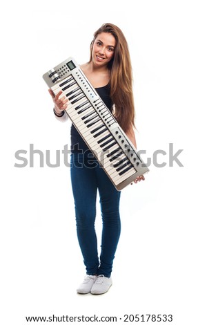 young woman holding an electronic piano over white