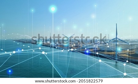 Wind power plant and technology. Smart grid. Renewable energy. Sustainable resources. Royalty-Free Stock Photo #2051822579
