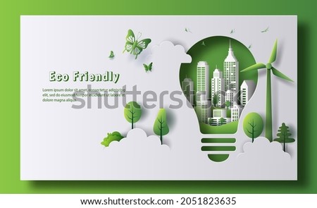 Design for an eco friendly banner, a light bulb shape with city and garden, save the planet and energy concept, paper illustration, and 3d paper. Royalty-Free Stock Photo #2051823635