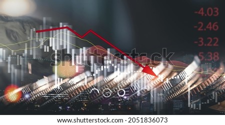 Eoconomic crisis, financial background. Double exposute of Coins and US dollars bank note currency with economic graph chart falling due to covid-19 pandemic, stock market crash Royalty-Free Stock Photo #2051836073