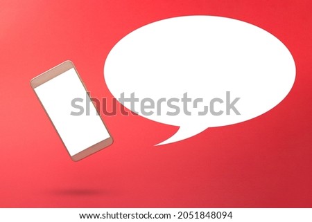 Blank white speech bubble with grey 3d smartphone icon against red background. 3D illustration design template background. Top mobile phone message. Advertisement idea. Empty speech balloon for ad