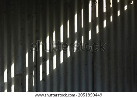 Light and shadow patterns affecting objects, abstract backgrounds.