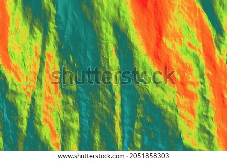 Abstract multicolored background. The pattern and texture of the fabric.