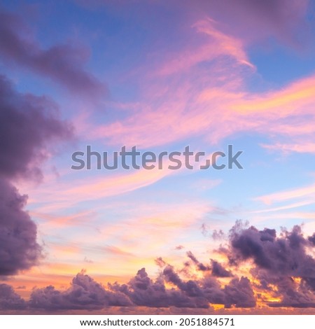 Colorful clouds on a summer morning, square background photo with bright tropical sky