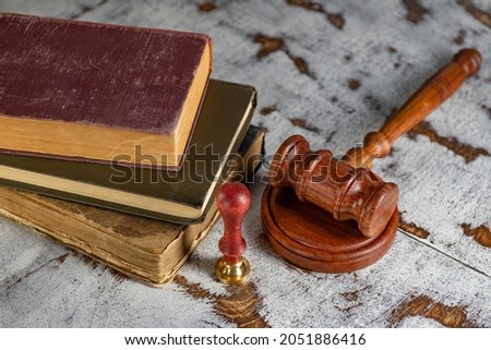Gavel Notary's public and stamp on testament and last will. Notary public tools