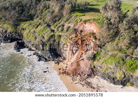Aerial view of landslide on coastal walking path at Oxley Beach in Port Macquarie NSW Australia. This damage occured during some of the largest flooding recorded in the area. Royalty-Free Stock Photo #2051895578