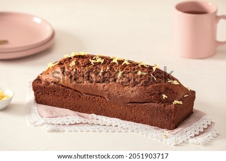 Tasty gingerbread cake on light background