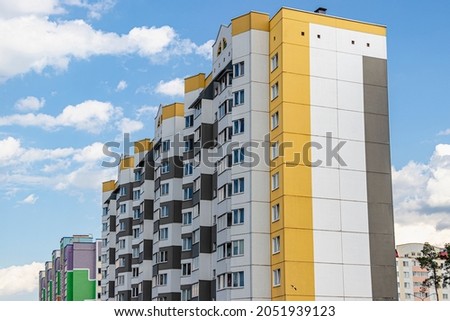 Modern multi-storey residential area. Construction of new residential buildings for young families. Modern housing construction. Residential fund. Mortgage Royalty-Free Stock Photo #2051939123