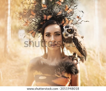 Amazing brunette beauty posing in autumn scenery Royalty-Free Stock Photo #2051948018