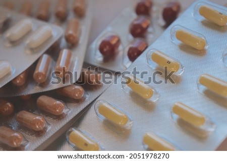                       pill blisters with medicine on a table         