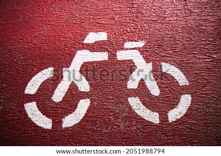 A bicycle sign with a red background in South Korea.