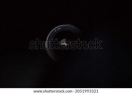Photography Photo Lens.  Estetic photo camera lens in a dark ambience

