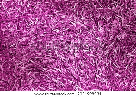 Fallen leaves in a purple tone. Purple texture or background.