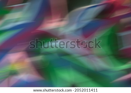 Blurr abstract background photo with the colors green,purple,pink,blue, yellow and white