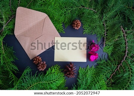 Christmas Background Minimalist Concept. Christmas Greeting Card With Fir Leaves, Fir Flowers And Round Wood. Idea. Christmas, winter, Flat lay, top view
