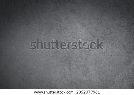 Abstract texture of dark gray vintage cement or concrete wall background. School education, dark wall backdrop, template for learning board concept.