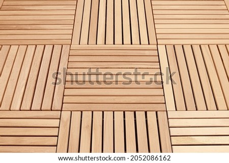 Slat floor or square wood decks arranged on the floor texture background