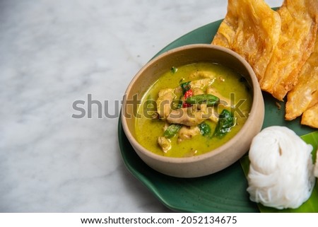 Here is a picture of the menu called Chicken Green Curry Roti. It is cooked by a professional chef.