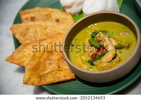 Here is a picture of the menu called Chicken Green Curry Roti. It is cooked by a professional chef.
