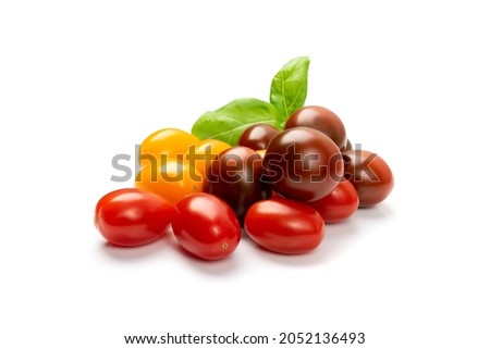 Long plum tomato group isolated. Fresh small red, brown and yellow cherry tomatoes assortment, mini organic cocktail tomate mix on white background Royalty-Free Stock Photo #2052136493
