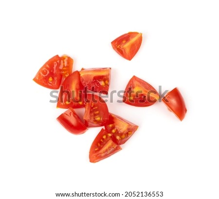Long plum tomato slices isolated. Fresh small cherry tomatoes wedges, mini organic cocktail tomate slice on white background top view Royalty-Free Stock Photo #2052136553