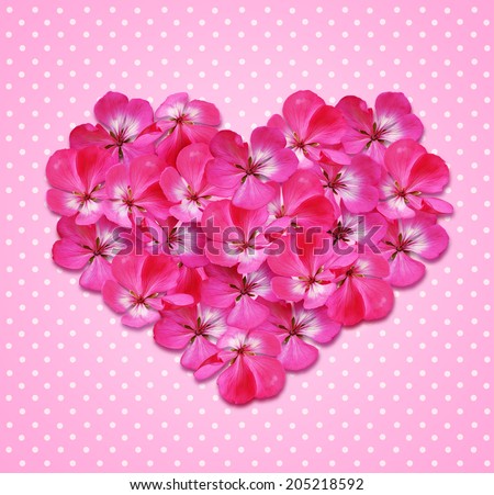 Heart with flowers on pink background for Valentine's day