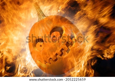 Halloween Pumpkins. Halloween pumpkin in party mood. Jack O Lantern. Isolated on white. Room for text. Halloween pumpkin on fire. 
