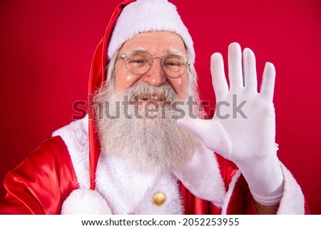 Santa Claus making selfie photos. Christmas night. Gift delivery. Enchanted dreams of children.

