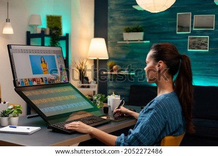 Retouch studio worker editing picture of model for photography agency. Caucasian artistic creative woman looking at computer monitor screen and photo retouching template software