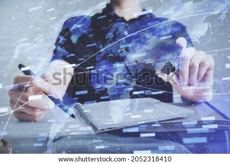 Double exposure of man hands holding a credit card and data theme drawing. E-commerce and technology concept.
