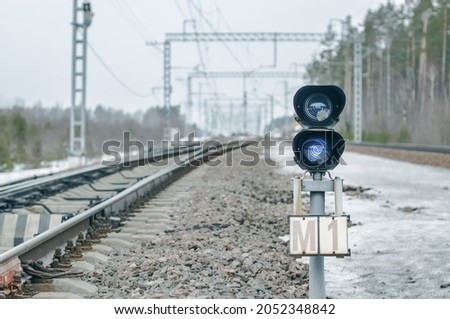 Terminal station, railway traffic light, stop blue light, freight and passenger trains station, switch shunter