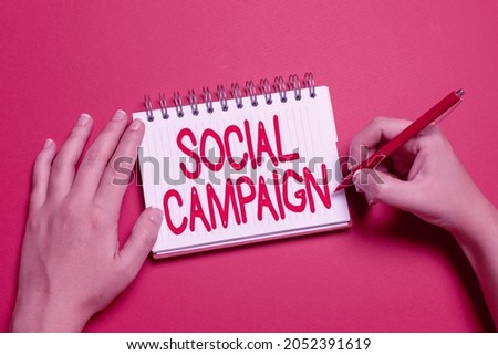 Text caption presenting Social Campaign. Conceptual photo use social media platform to improve brand awareness Writing New Ideas Telling Message And Informations Taking Important Notes