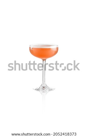 Raspberry sour cocktail in glass isolated on white background. Classic alcohol drink in champagne glass. Cocktail with egg foam. Citrus sour cocktail over white Royalty-Free Stock Photo #2052418373