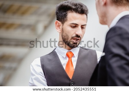 businessman expression lie speak or do something wrong, avoiding his gaze from problem Royalty-Free Stock Photo #2052435551