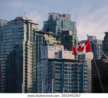 Vancouver downtown business district buildings and apartments with Canada flag
