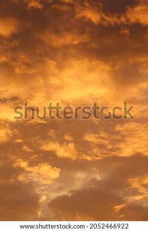 Cloudy sky natural orange colours in the morning, abstract backgrounds 