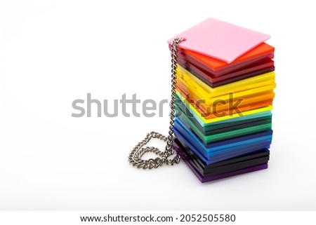 Colorful acrylic sheets plastic samples on white background , equipment for creativity and decoration