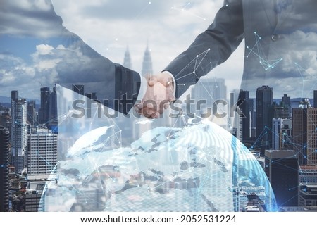 Businessmen shaking hands on bright white city background with globe and polygonal connections. Teamwork and colleagues concept. Double exposure