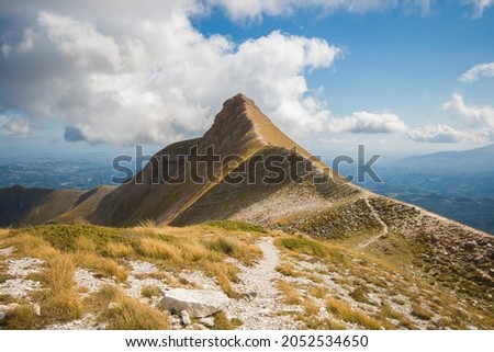View of the peak of Monte Sibilla: the magical mountain of legends in the national park of Monti Sibillini Royalty-Free Stock Photo #2052534650
