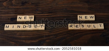 new mindset new result, text words typography on wooden background, life and business motivational inspirational concept
