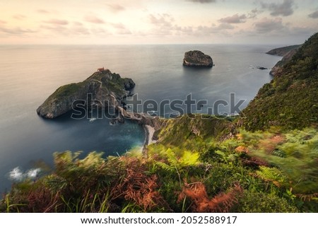 High view from the fmous Gaztelugatxe rock next to Bermeo and Bakio at Bizkaia, the Basque Country.	