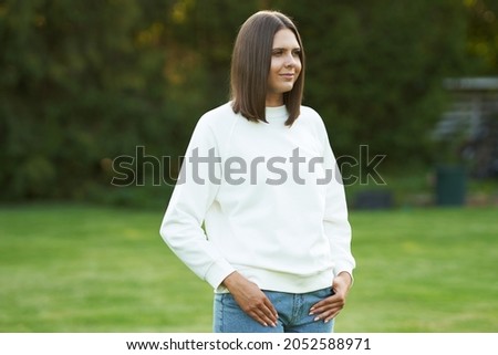 Young woman in white blouse
