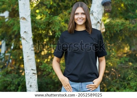 Young woman in black shirt