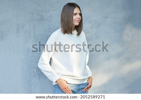 Young woman in white blouse