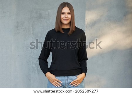 Young woman in black blouse